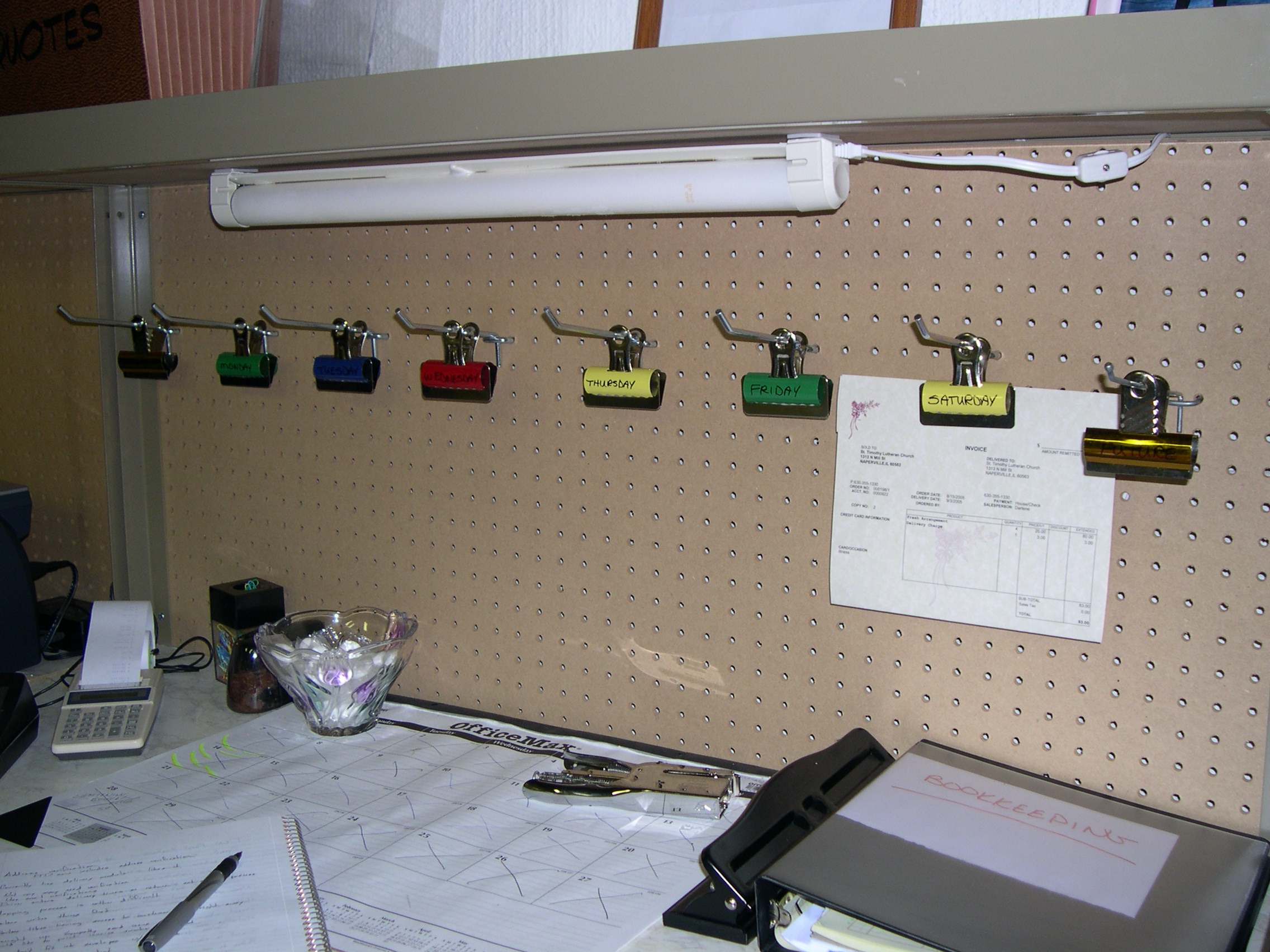 Photo of a makeshift calendar at a florist shop